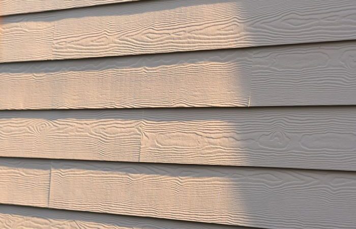 Replace vinyl siding with hardie board