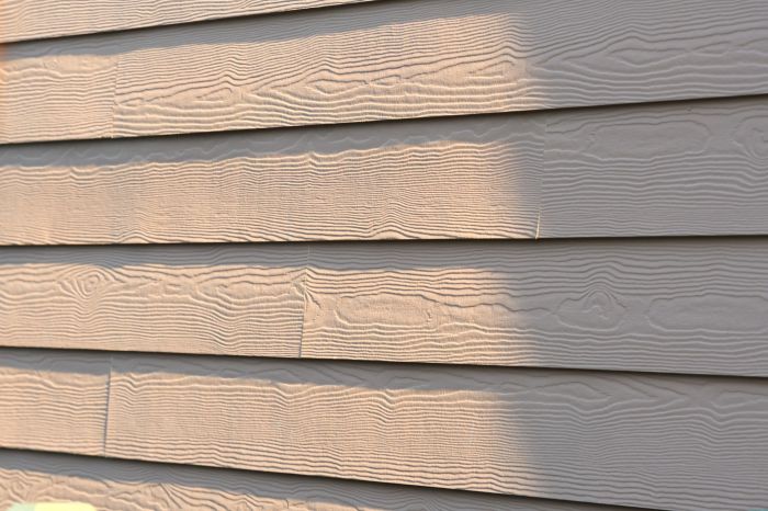 Replace vinyl siding with hardie board